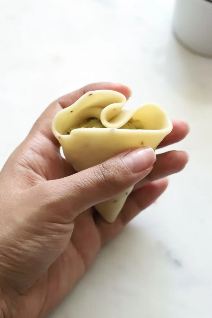 Folding the best vegetable samosas