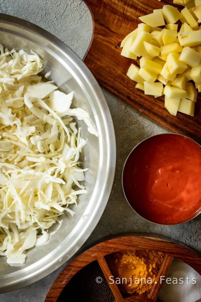 Shredded white cabbage, potatoes and spices for curry or sabji