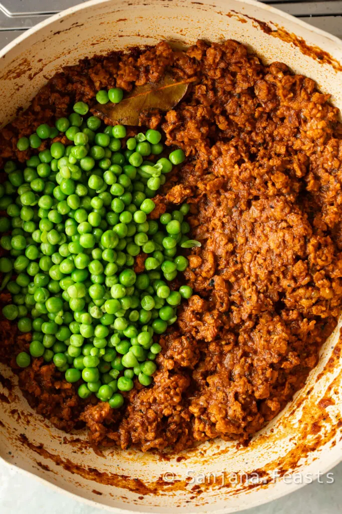 Add peas to keema matar