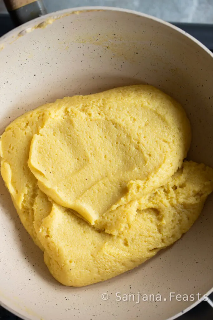 Cook the mixture until it forms a soft ball