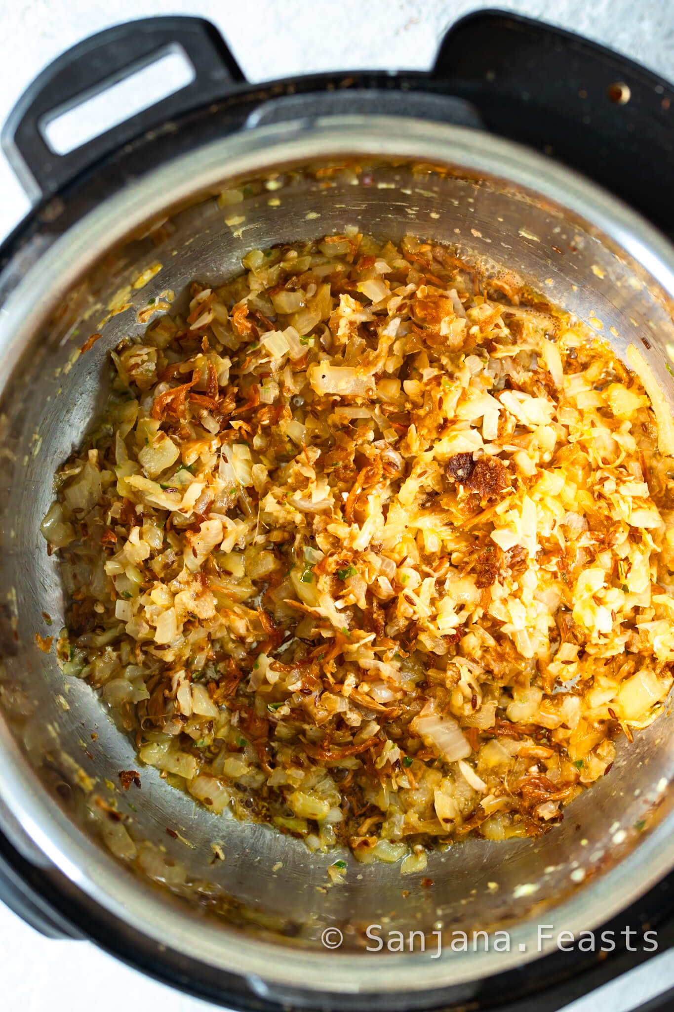 Brown the onions for Dal Makhani Recipe (Slow Cooker Instant Pot)