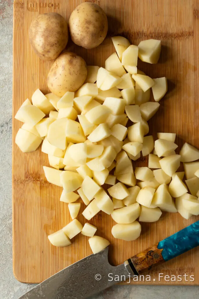 Chop the potatoes into cubes