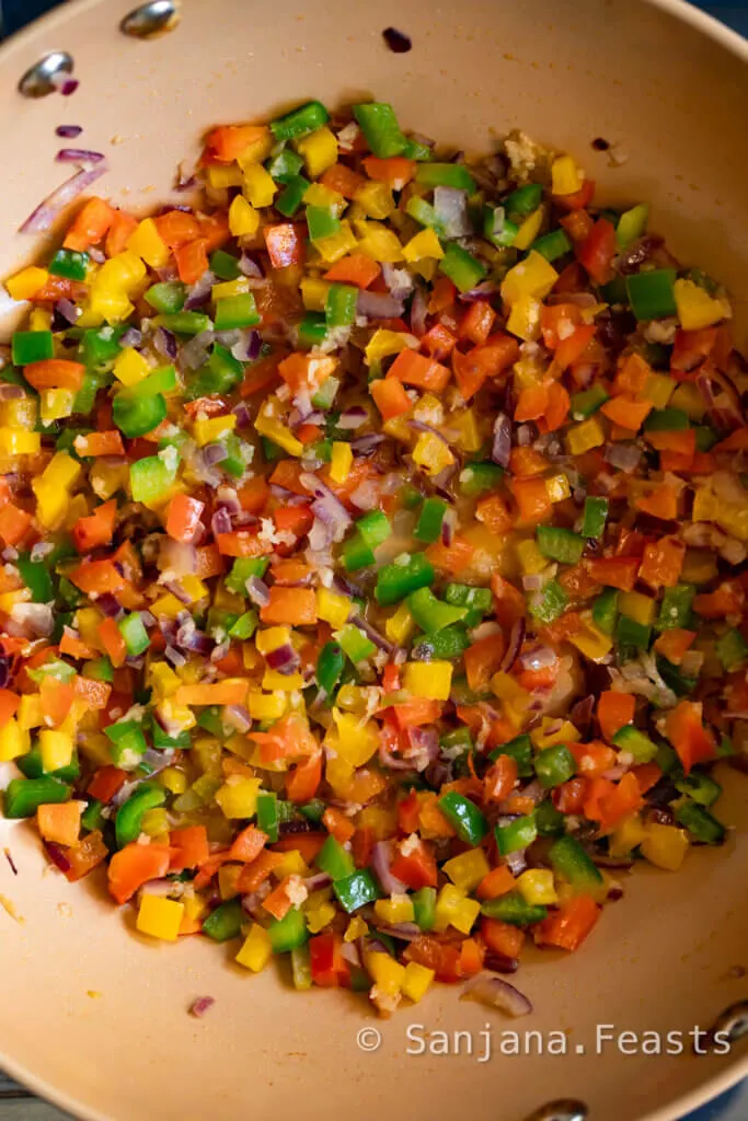 saute the onions and peppers with garlic