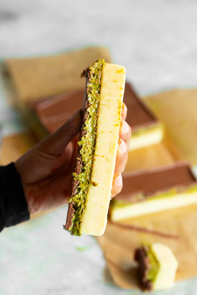 a slice of dubai chocolate burfi with three layers