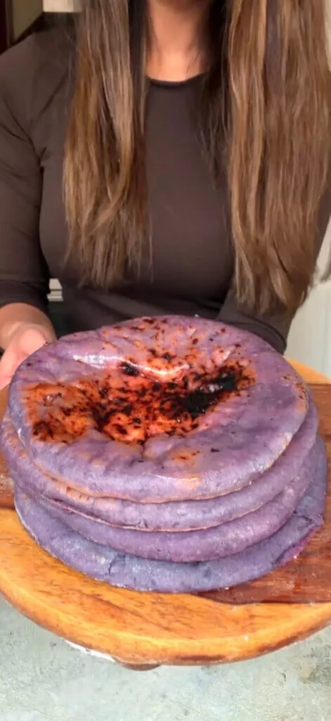 a stack of cheese-naan-with-paneer-and-mozzarella